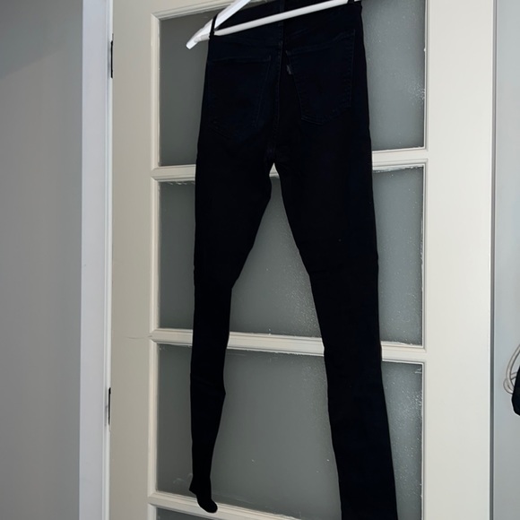 Black super high rise ripped skinny jeans from Levi’s - Picture 2 of 6